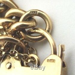 Ladies/womens 9ct gold vintage charm bracelet with 15 charms + padlock fastening