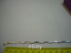 Lovley Sparkly-fancy 9ct White Gold Bracelet-cubic Stones -7.1 Wiggly Design