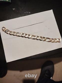 Mans 9ct gold Heavy Figaro bracelet 63.1 Grams 9.5 Long