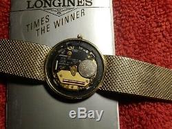 Mans solid 9ct gold longines watch with solid 9ct gold bracelet. +box and book