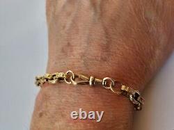 Mens 9ct gold antique patterned belcher bracelet length 8 weight 12.8 grams