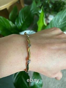 New In Box Beautiful 9ct Yellow And White Gold Wave Design Bracelet