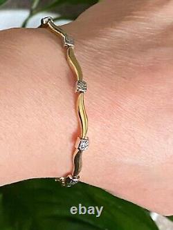 New In Box Beautiful 9ct Yellow And White Gold Wave Design Bracelet