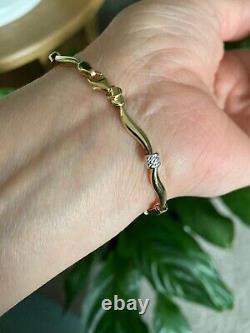 New In Box Beautiful 9ct Yellow And White Gold Wave Design Bracelet