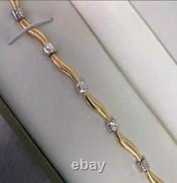 New In Box Beautiful 9ct Yellow And White Gold Wave Design Bracelet
