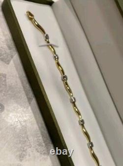 New In Box Beautiful 9ct Yellow And White Gold Wave Design Bracelet
