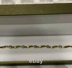 New In Box Beautiful 9ct Yellow And White Gold Wave Design Bracelet