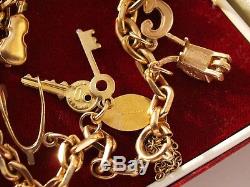 Rolled gold bracelet and solid 9ct yellow gold charms 22.60 grams