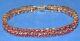 Secondhand 9ct Yellow Gold Treated Red Ruby Line Bracelet 19cm