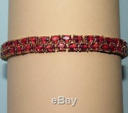 SECONDHAND 9ct YELLOW GOLD TREATED RED RUBY LINE BRACELET 19cm