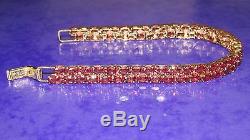 SECONDHAND 9ct YELLOW GOLD TREATED RED RUBY LINE BRACELET 19cm