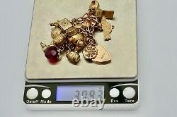 SUPERB VINTAGE HM 9ct GOLD CHARM BRACELET 30.9 grams