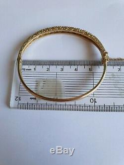 Sapphire & diamond 9ct gold hinged bangle Total weight13.5gm