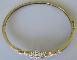 Secondhand 9ct yellow gold multi diamond crossover hinged bangle/bracelet (9.8g)