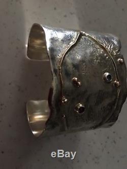 Sterling silver wide cuff bracelet with 9ct gold detail and semi precious stones