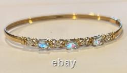 Stunning 9ct gold diamond And Aquamarine Bangle, bracelet, 4.9 gr