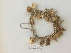 Stunning Vintage 9ct Gold Curb Link Charm Bracelet With 16 Charms 52.52 Grams