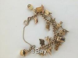 Stunning Vintage 9ct Gold Curb Link Charm Bracelet With 16 Charms 52.52 Grams