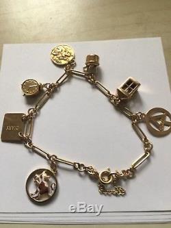 Vintage 9ct. 375. Yellow Gold. Charm Bracelet With 7 Charms. 8 Inch (20cm)