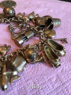 Vintage 9ct Gold Charm Bracelet With 26 Charms, Weighs 56Gms