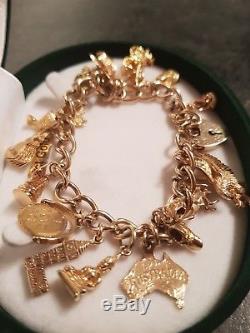 Vintage 9ct gold charm bracelet 17 charms 14ct 18ct gold (read despription)