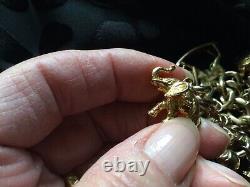 Vintage 9ct gold charm bracelet with 14 charms And Valuation 103.60g