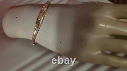 Vintage 9ct rose gold hollow bangle with ornate pattern
