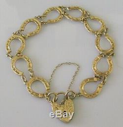 Vintage 9ct yellow gold multi horse shoe (9.9g) bracelet & safety chain