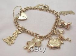 Vintage Heavy 9ct Gold Curb Link Charm Bracelet With Padlock and Eight Charms