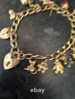 Vintage Solid 9CT Gold Charm Bracelet with 14 CHARMS Hallmarked 18.28grams