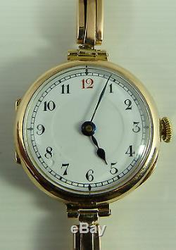 Vintage ladies 9ct gold Swiss wrist watch on 9ct expanding bracelet Working Ord