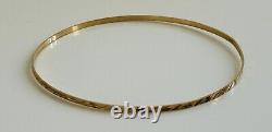 Women's 9ct Yellow Gold Thin Bangle Bracelet -Diamond Cut Design- From H. Samuels