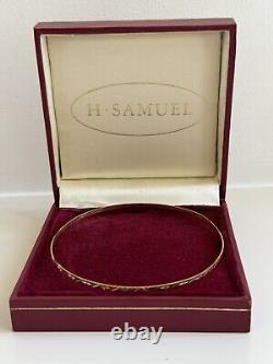 Women's 9ct Yellow Gold Thin Bangle Bracelet -Diamond Cut Design- From H. Samuels